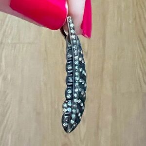 Oxidized Silver with Pavé Diamonds feather pendant.